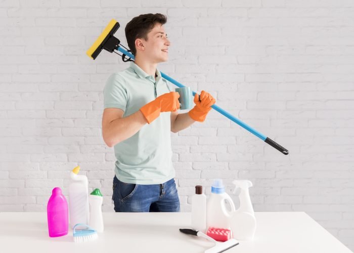 portrait-man-cleaning-his-house